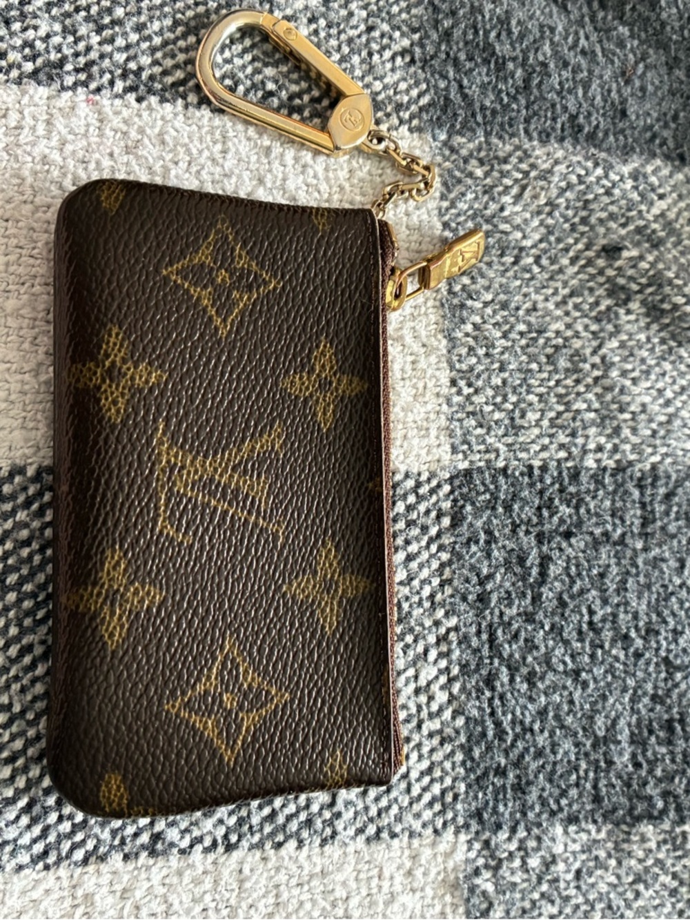 Authentic, Louis Vuitton Brown Coated Canvas Key Pouch with Gold Hardware